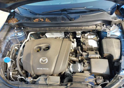 2021 Mazda Cx-5 Grand Touring z USA, uszkodzony, nr VIN JM3KFBDM5M0343058